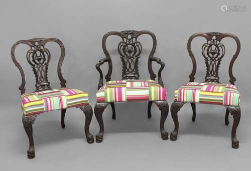 A SET OF EIGHT MAHOGANY CHIPPENDALE STYLE DINING CHAIRS, ear...