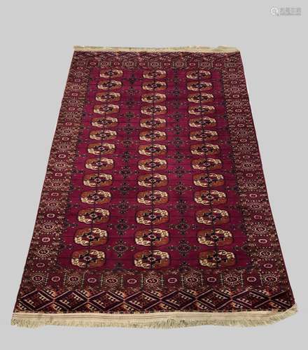 A TEKKE RUG, Emirate of Bukhara, c.1910, the raspberry field...