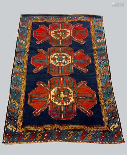 A KAZAK RUG, Central Caucasus, c.1910, the royal blue field ...