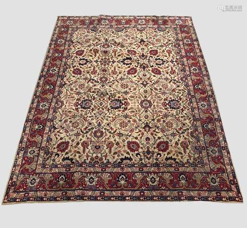 A TABRIZ CARPET, North West Iran, c.1930, the ivory field wi...