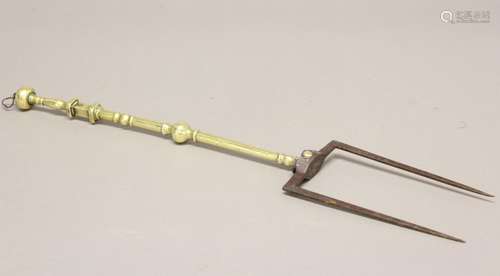 AN 18th CENTURY IRON AND BRASS TOASTING FORK. An unusual toa...