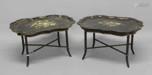 A NEAR PAIR OF 19TH CENTURY PAPIER MACHE TRAYS ON STANDS, th...
