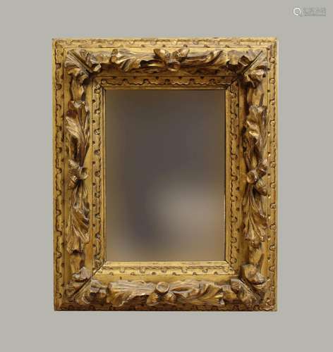 AN 18TH CENTURY STYLE GILT FRAMED MIRROR. A rectangular mirr...