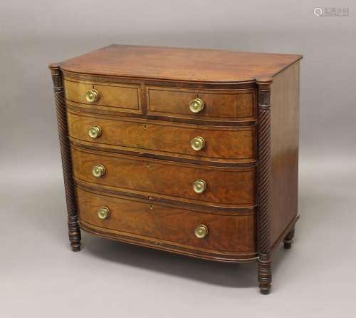A REGENCY MAHOGANY BOW FRONTED CHEST OF DRAWERS, the shaped ...