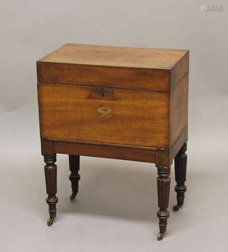 EARLY 19TH CENTURY MAHOGANY CELLARETTE, with fitted interior...