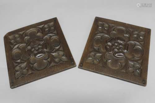 A PAIR OF 17TH CENTURY STYLE CARVED PANELS. A pair of carved...