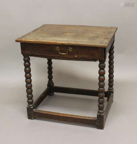 AN 18TH CENTURY OAK SIDE TABLE, the rectangular top above a ...