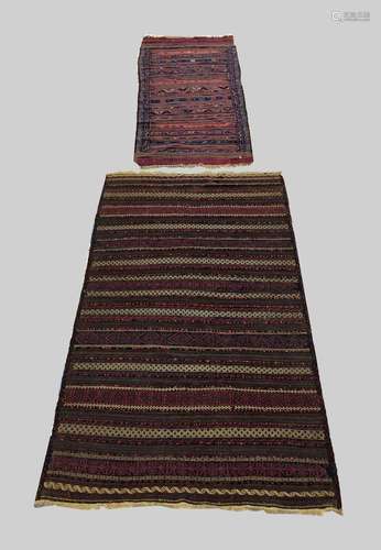 A BALOUCH KILIM, West Afghanistan, c.1900, the field of wide...