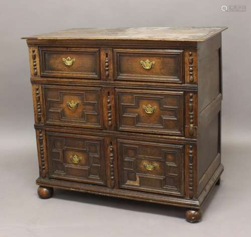 AN OAK CHEST OF DRAWERS, 17th century and later, with three ...