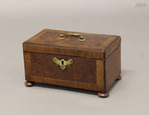 A GEORGE II BURRWOOD TEA CADDY, with a three section interio...