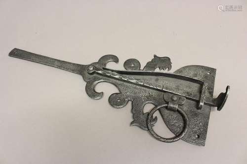 A 17TH CENTURY STEEL DOOR LATCH. An English 17th century ste...