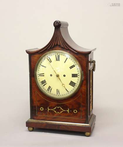 A REGENCY BRASS INLAID BRACKET CLOCK. A Regency mahogany bra...