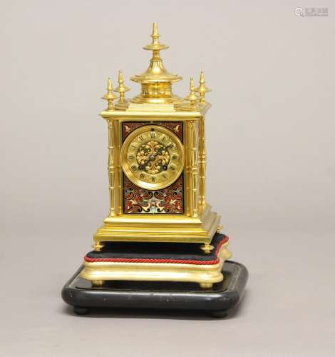 A VICTORIAN GILT BRASS AND ENAMEL MANTEL CLOCK. The dial wit...