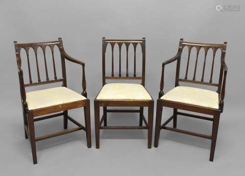 A SET OF FOURTEEN MAHOGANY DINING CHAIRS, comprising two car...