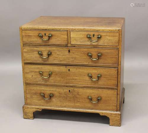 A LATE GEORGE III MAHOGANY CHEST OF DRAWERS. The chest with ...