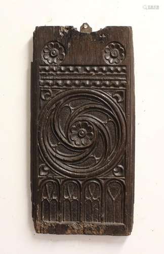 A 16TH CENTURY PEW END SECTION. A rectangular section from a...