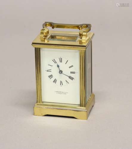 A BRASS CASED CARRIAGE CLOCK BY GARRARD OF LONDON. A brass c...