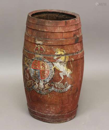 A RED PAINTED BARREL WITH ROYAL COAT OF ARMS. A red painted ...