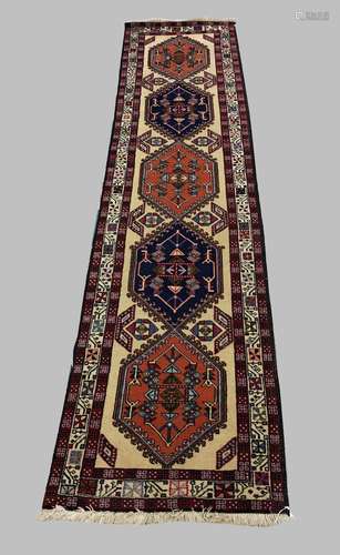 A NARROW SARAB RUNNER, North West Iran, c.1960, the pale mus...