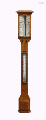 A VICTORIAN OAK STICK BAROMETER BY WRIGHT & CO. WESTMINSTER,...