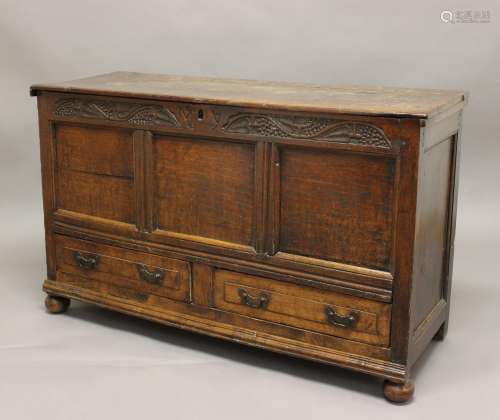 AN OAK MULE CHEST, 18th century and later, the carved frieze...