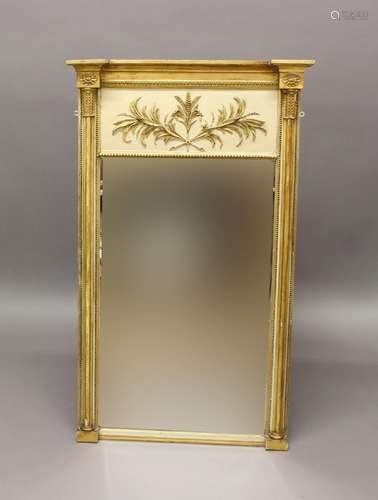 A REGENCY CREAM AND GILT PIER MIRROR. With a rectangular bev...