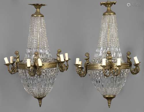 A PAIR OF LARGE AND ELABORATE FRENCH STYLE CHANDELIERS. Each...