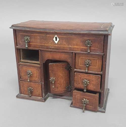 A GEORGE II STYLE MINIATURE WALNUT KNEEHOLE DESK, late 18th/...