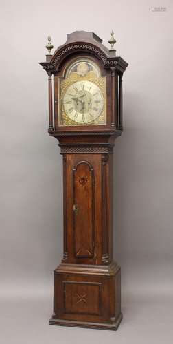 AN OAK AND MAHOGANY CASED LONGCASE CLOCK. With a silvered di...