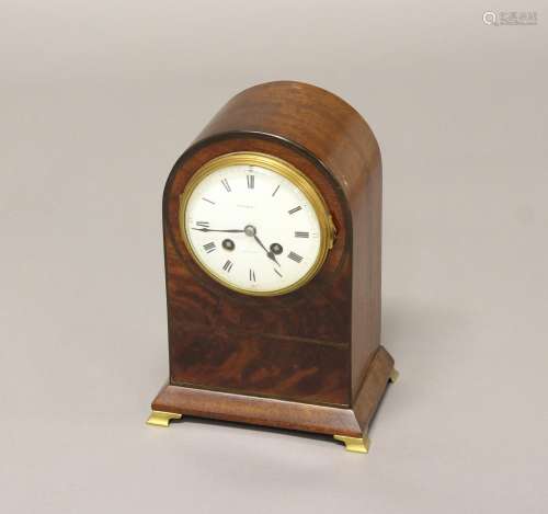 AN EDWARDIAN MANTLE CLOCK BY MAPLE AND Co. The clock with a ...