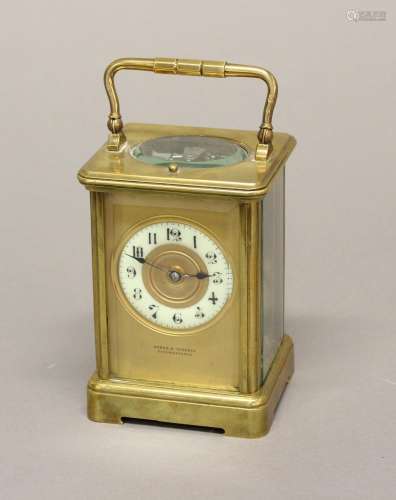 A LATE 19TH CENTURY BRASS CASED CARRIAGE CLOCK. With enamell...