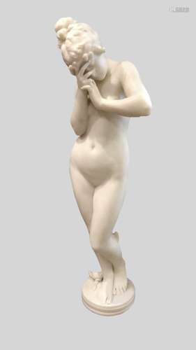 A VICTORIAN MARBLE STATUE OF A NAKED WOMAN. The white marble...