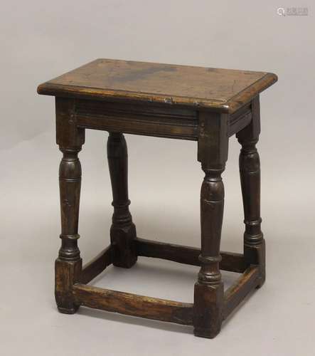 A 17TH CENTURY OAK JOINT STOOL, the rectangular top on turne...