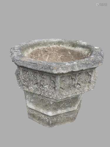 A LARGE GOTHIC REVIVAL COMPOSITION STONE GARDEN URN. With a ...