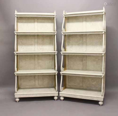 A PAIR OF WATERFALL OPEN BOOKSHELVES, 20th century, the five...