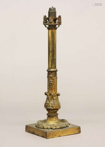 A VICTORIAN GILT BRASS TABLE CANDLE STICK. A mid Victorian b...