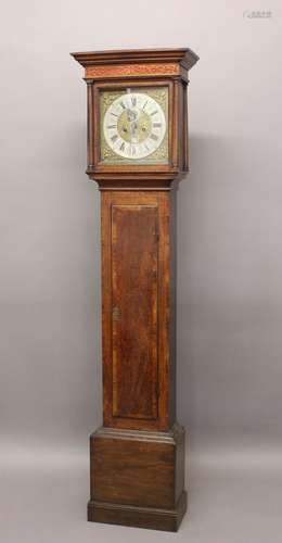 AN OAK AND MAHOGNAY LONGCASE CLOCK BY MEEKINGS OF DUBLIN. Th...