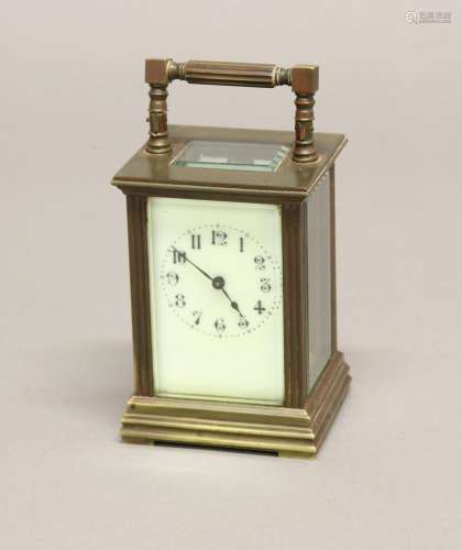 A VICTORIAN BRASS CASED CARRIAGE CLOCK. A brass cased carria...