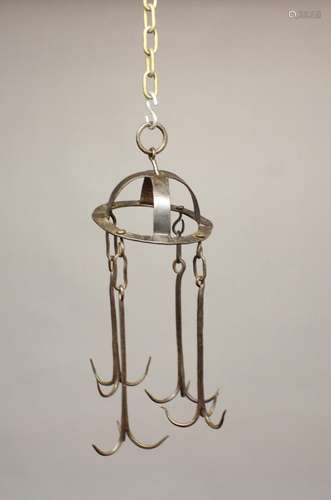 AN 18TH CENTURY WROUGHT IRON GAME HOOK. A 'Dutch Crown' type...