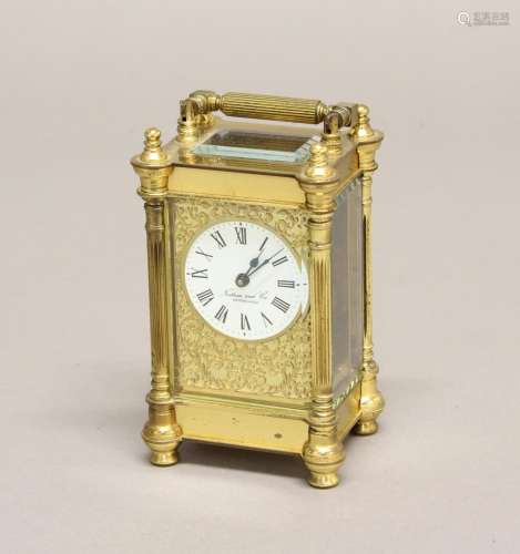 A VICTORIAN STYLE BRASS CASED CARRIAGE CLOCK BY NATHAN OF BI...