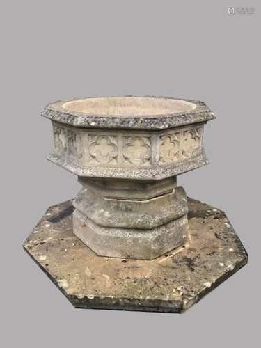 A LARGE COMPOSITION STONE GOTHIC REVIVAL URN. The urn with a...