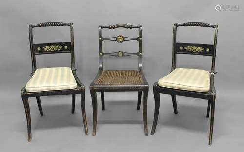 SEVEN SIMILAR REGENCY BRASS MOUNTED SALON CHAIRS. A matched ...