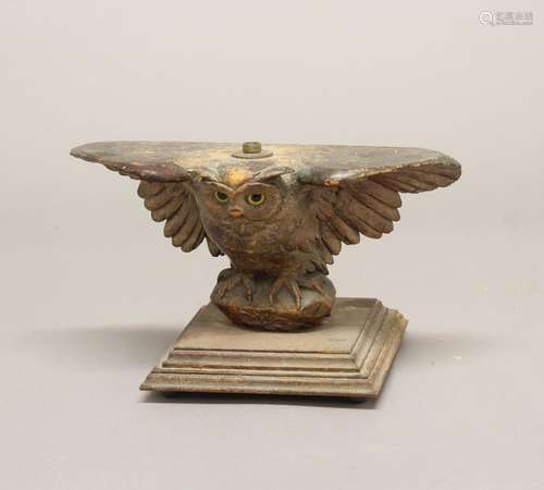 A VICTORIAN CARVED OWL LAMP STAND. A Victorian lamp base or ...