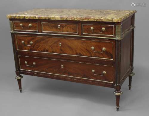 A LOUIS XVI MAHOGANY AND BRASS MOUNTED CHEST OF DRAWERS, wit...