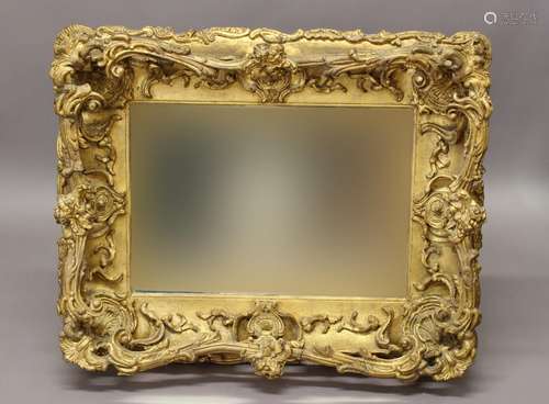 AN ELABORATE LATE 19TH CENTURY STYLE WALL MIRROR. An elabora...