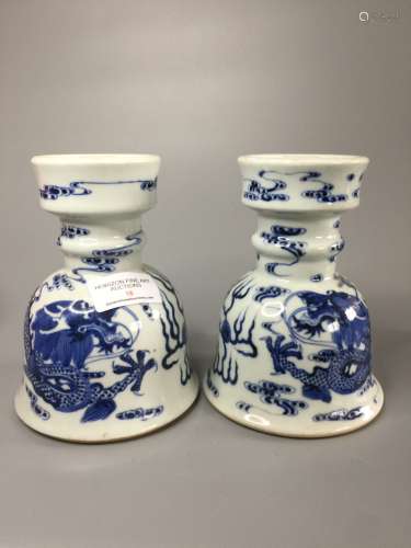 A PAIR OF CHINESE BLUE AND WHITE CANDLE HOLDER ,DECORATED DR...