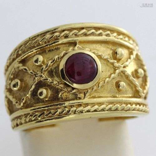 Bague en or ornée d’un cabochon de rubis - Poids brut : 11,2...