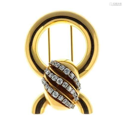 Broche ou clip couture en or ornée de diamants totalisant en...