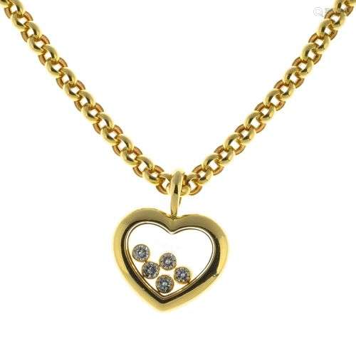 CHOPARD. Collier “Happy Diamonds” en or avec pendentif coeur...