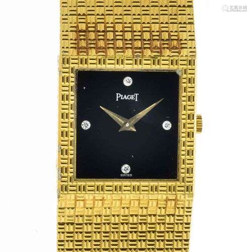 PIAGET. Montre de dame en or - Cadran rectangulaire à fond n...